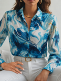 Sarah – A loose-fitting long-sleeved blouse with buttons